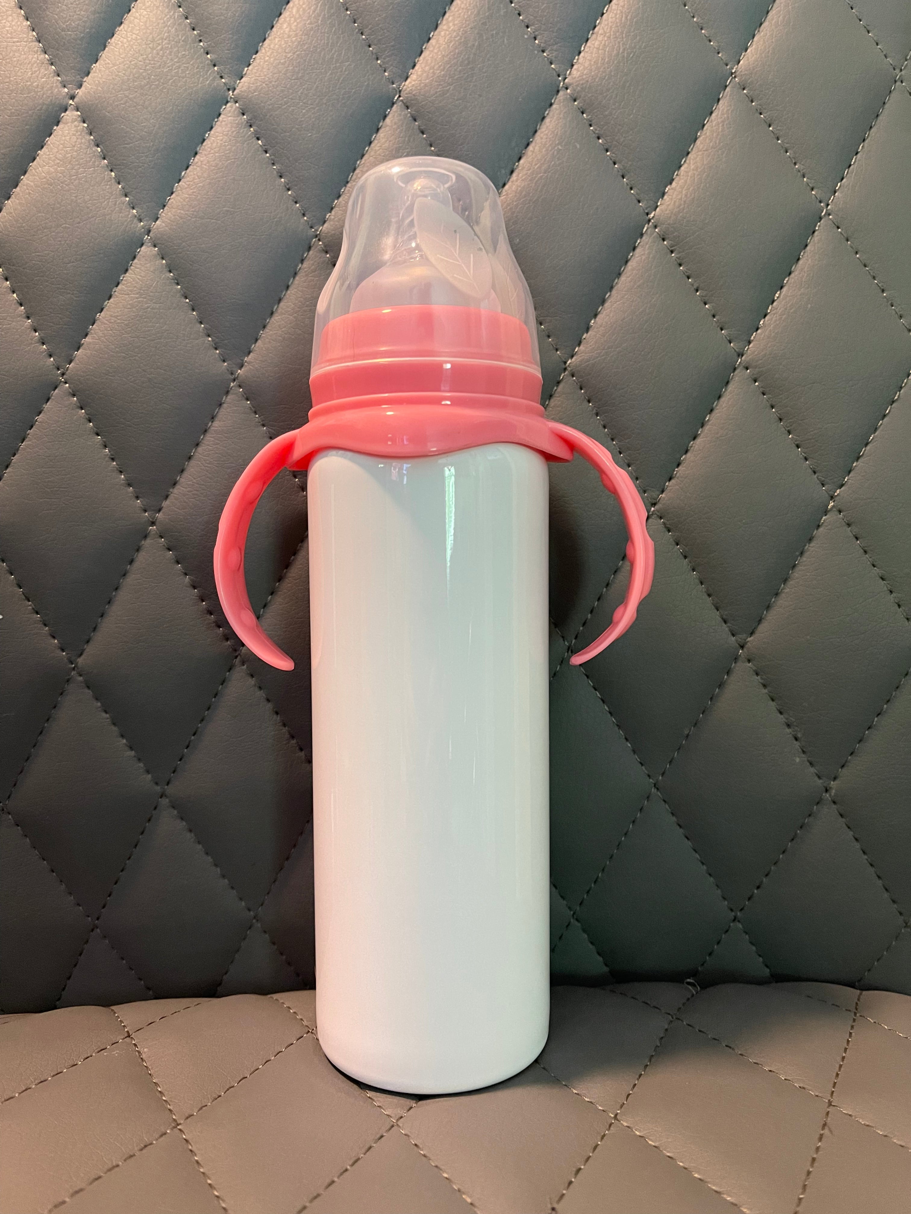 Pink and blue baby bottles